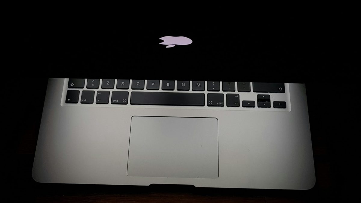 Dark MacBook with screen light